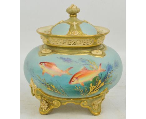 A large Royal Worcester hand painted bowl and cover by Harry Davis, finely painted with two fish to the front and a further f