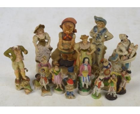 A Hummel figure of a young girl feeding ducks (af) and a quantity of Continental figures and two small Wade figures (16).