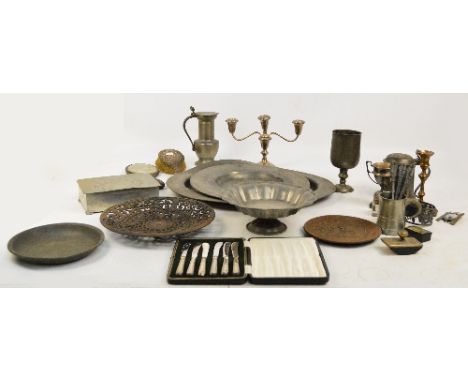 A quantity of metalware including pewter oval platter, hammered pewter lidded box, pewter tankard, a loaded three light cande