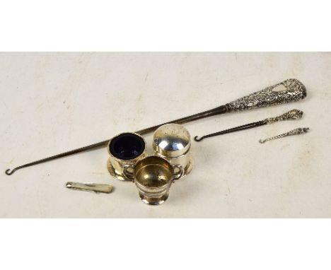 A very large Victorian hallmarked silver sheath handled button hook, with foliate scroll decoration, Birmingham 1891, length 