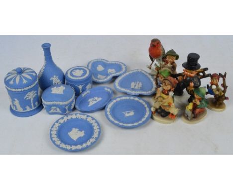 A group of seven Hummel figures and a quantity of Wedgwood pale blue jasperware.