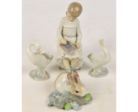 Three Lladro figures; two depicting geese, one depicting a rabbit, also a Nao figure of a seated girl, height 18.5cm (4). CON