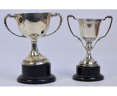 A George V hallmarked silver large twin handled trophy cup with loaded base, without inscription, S Blanckensee & Sons, Chest
