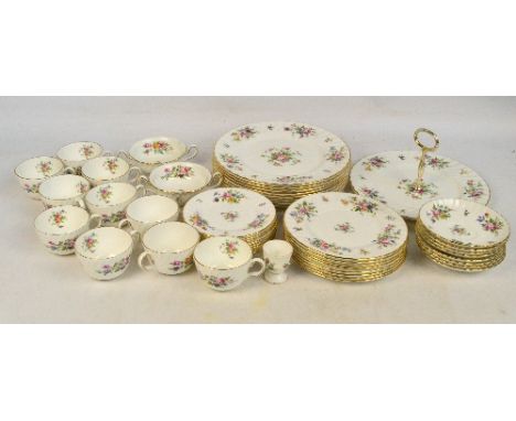 A quantity of Minton dinner and tea ware in Marlow pattern, comprising ten dinner plates, eight dessert plates, two twin hand