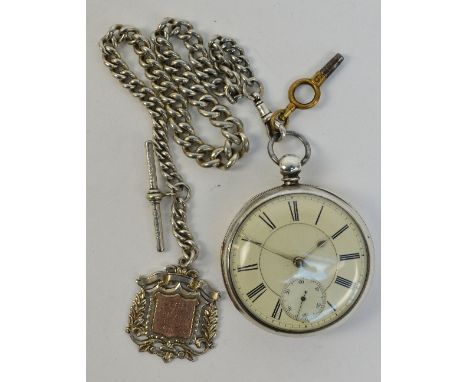 A late 19th century silver cased open face key wind pocket watch, the circular enamel dial set with Roman numerals and subsid