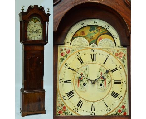 An early 19th century mahogany longcase clock, the swan neck pediment above arched painted dial with eight day movement and r