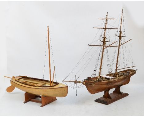 Two scratch built models of boats, one of "Harvey" 1847, 1:50 scale, length 88cm, both on stands.