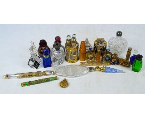 Twenty-six various scent bottles and scent phials including gilt heightened examples, ruby tinted examples, etc.
