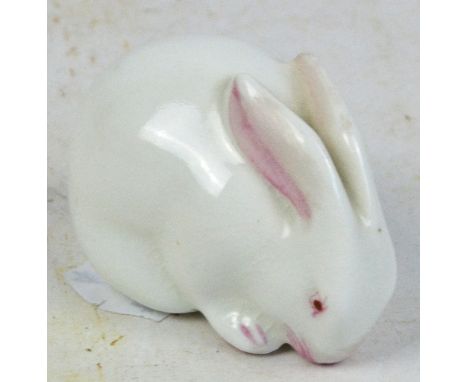 A Royal Worcester "Rabbit" netsuke with green printed marks, date code for 1913, length 4.75cm. CONDITION REPORT: Appears goo