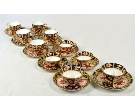 A collection of ten various Royal Crown Derby Imari pattern decorated cups and saucers comprising a matched set of six, a set