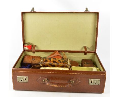 A vintage suitcase containing a small quantity of tins, trinket boxes, also a large pottery vase and a damaged cut glass vase