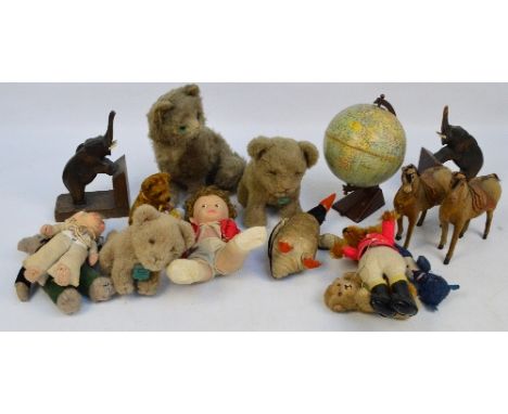 A small collection of various vintage stuffed plush toys including jungle toys "Cubby" tigers with original tags, a seated ca