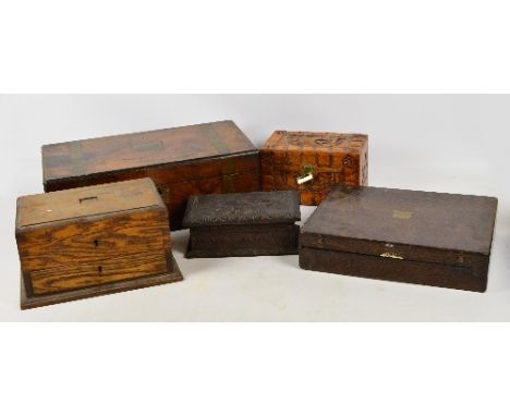 A Victorian walnut writing slope, for restoration, a decorative carved trinket box, two other trinket boxes and a cutlery box
