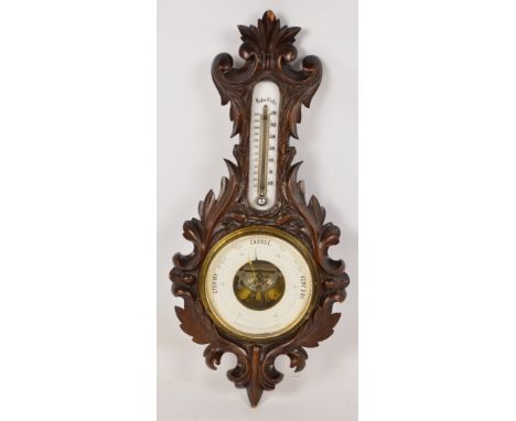 A late 19th century carved mahogany holosteric barometer/thermometer, with foliate scroll motif, height 49cm. CONDITION REPOR