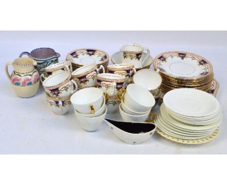 A WSJ "Lewis" pattern decorated tea service, comprising twelve trios, sugar bowl, cream jug and two sandwich plates, a furthe