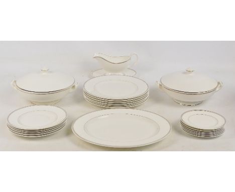 A Royal Worcester white and silver heightened dinner service, comprising six dinner plates, six side plates, five salad plate