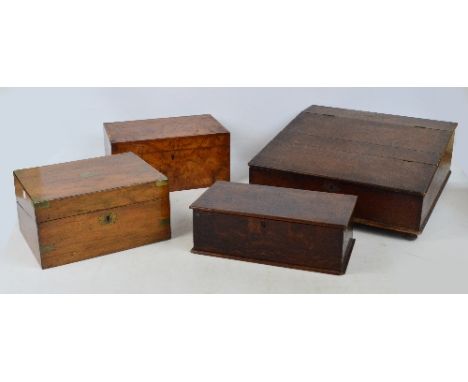 A 19th century mahogany lap desk with lozenge shaped escutcheon and cartouche, the sloping hinged lid enclosing two drawers, 