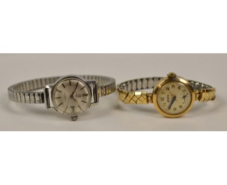 OMEGA; a lady's stainless steel automatic wristwatch with date aperture and silver batons on expandable strap, and a Technos 