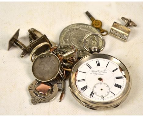 A small quantity of silver jewellery comprising two pairs of 925 standard silver cufflinks, a pierced silver fob, a silver sp