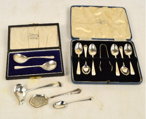 A case set of six George V hallmarked silver rat tail teaspoons in Hanoverian pattern with matching sugar tongs, Cooper Broth