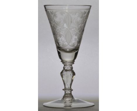 An early to mid 18th century Dutch light baluster, the conical bowl finely engraved with a medallion centred with William of 