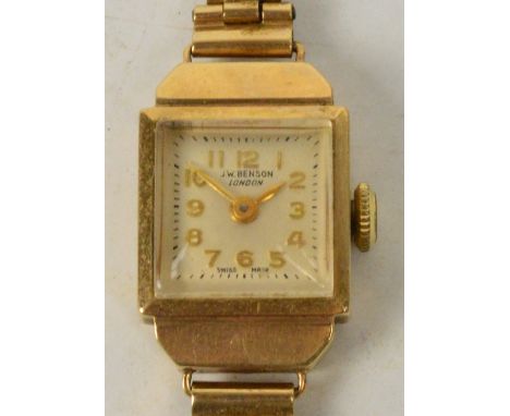 JW BENSON OF LONDON; an Art Deco 9ct yellow gold cased manual wind lady's cocktail wristwatch, the square dial set with appli