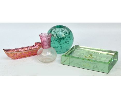 A Victorian green glass dump paperweight/inkwell (lid missing), height 9cm, with pontil mark to the base, a pink tinted glass