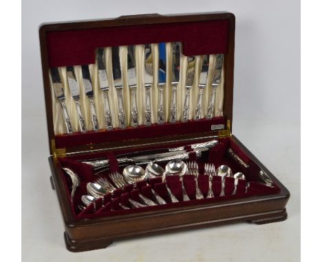 A walnut cased canteen of plated King's pattern cutlery, six settings including tea, coffee and soup spoons, plus two tablesp