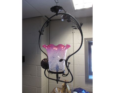 A brass hanging lamp with pink opalescence shade - converted for electricity  