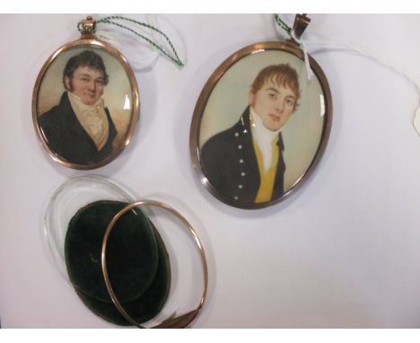 Two early 19th century oval portrait miniatures of gentleman, the reverse with a lock of hair (2)
