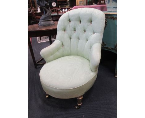 Two early 19th century button back easy chairs  