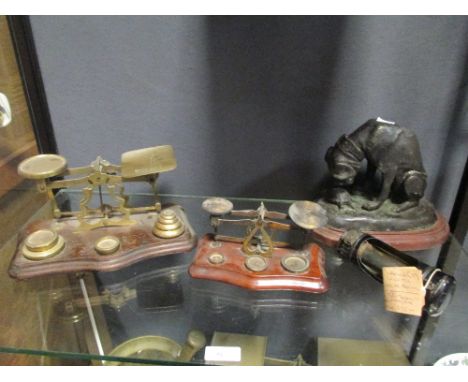 Three sets of postal scales and weights etc., a mortar and pestle, candle lamp, model of a dog and a Reeves thermometer  
