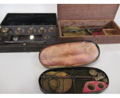 A cased part set of jeweller's weights by Baird & Tatlock, Hatton Garden, together with two cased sets of scales  