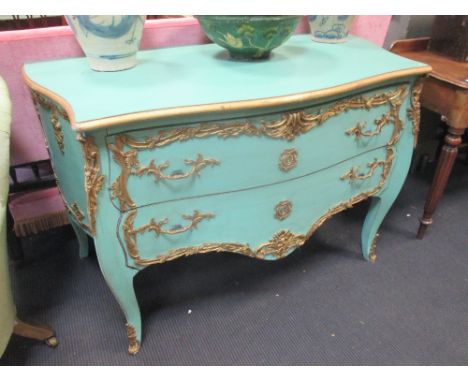 A 20th century Venetian commode, painted in a lime green with carved wood applied leaf carved mounts  