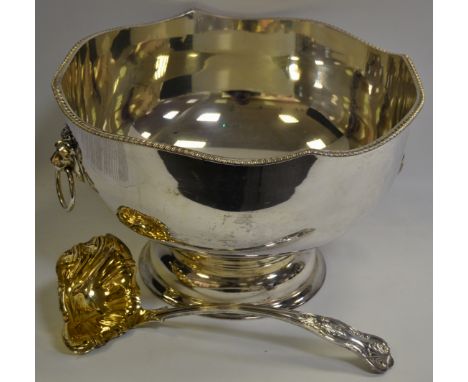 Silver Plated Ware - a mid 20th Century silver plated punch bowl, lion mask handles; a Sheffield gilded punch ladle (2)