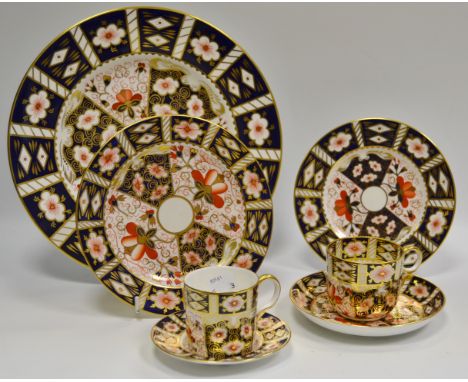 A Royal Crown Derby 2451 pattern plate; side plate, another; a pair of coffee cans and saucers 