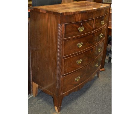 A George III bow fronted chest c 1810