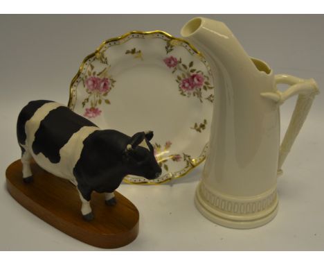 A Beswick matt Friesian Bull, wooden plinth; a Worcester blanc de chine horn handled ewer; A Royal Crown Derby Royal Pinxton 