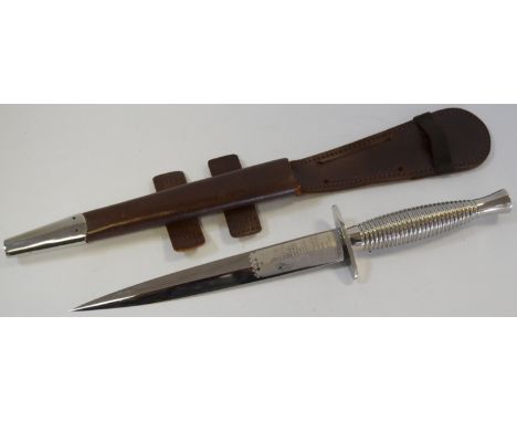 A  Wilkinson Sword Third Pattern Commando type dagger, 17.5cm  blade etched with a maker's panel for Wilkinson Sword,  brown 