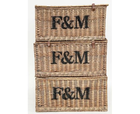 FORTNUM &amp; MASON HAMPER BASKETS, a set of three cane woven with rising lids, 76cm W x 53cm D x 41cm H. (3)