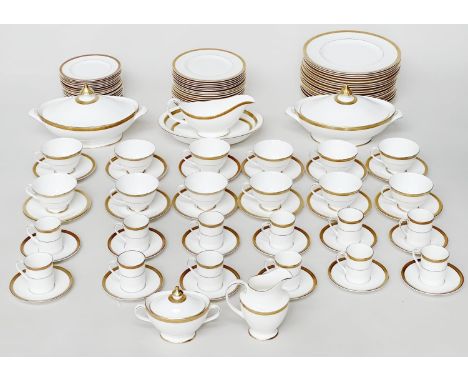 DINNER SERVICE, English Bone China Royal Worcester 'Royal Gold', a large service including eighteen dinner, side and tea plat