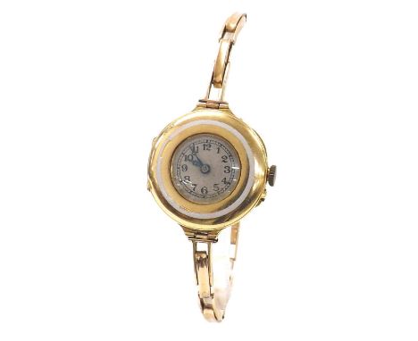 Swiss 18ct and enamel lady's wristwatch on a 15ct expanding bracelet, 22.6gm, 26mm . Condition Report: . Movement - currently