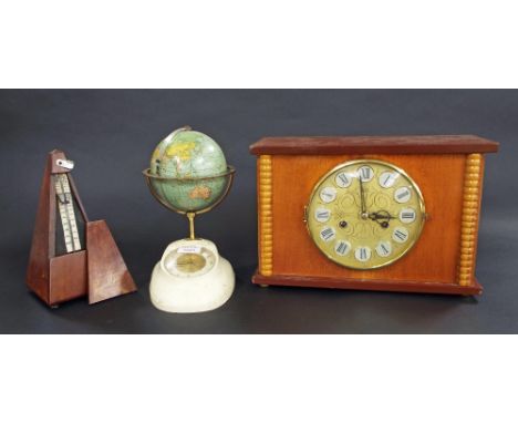 Contemporary mahogany two train mantel clock striking on three rods, 14" wide; also a German 20th century globe clock and an 