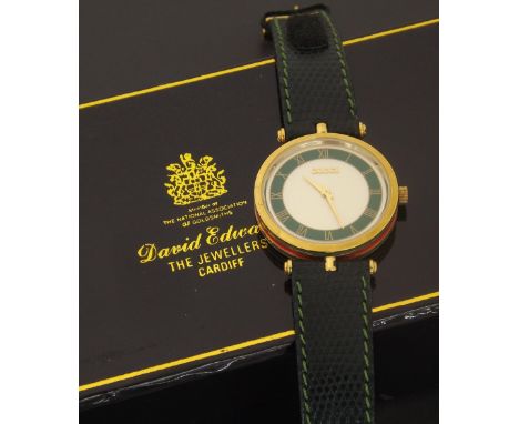 Gucci Classic lady's wristwatch, ref. 2040L, circular silvered dial with green Roman numeral chapter, champleve enamel case w
