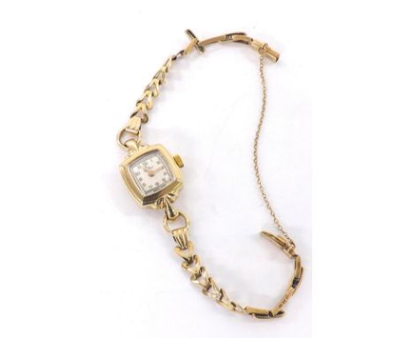 Record 9ct lady's bracelet watch, 13.1gm, 17mm . Condition Report: . Movement - currently working. Dial - good. Glass - good.