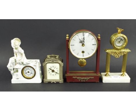 Contemporary Orfac drumhead mantel clock timepiece, 9" high; also a small porcelain figural mantel timepiece, 7.75" high; ano
