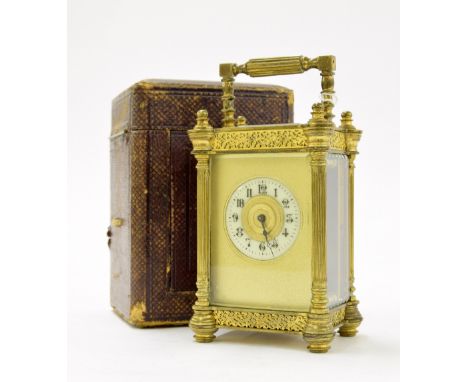 Carriage clock timepiece, the 1.5" cream chapter ring within a gilt mask and ornate pillared case, 5.5" high; also with Moroc
