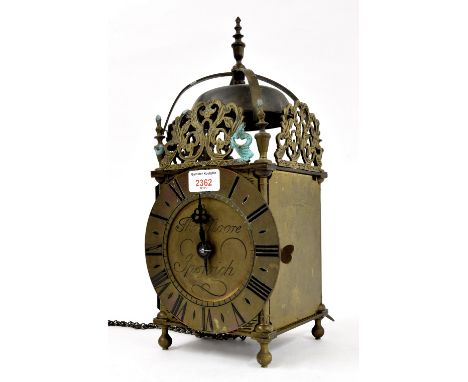 Reproduction hook and spike brass lantern clock, the 6.5" brass chapter ring enclosing a plain centre signed Thomas Moore, Ip