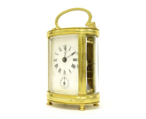 French oval carriage clock timepiece with alarm, striking on a bell fitted in the base, 6.5" high