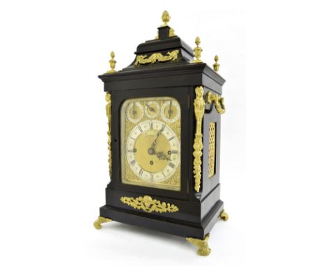 English ebonised triple fusee boardroom clock, the brass dial signed Curtis & Sprigg, Leicester on an arched plaque to the ma